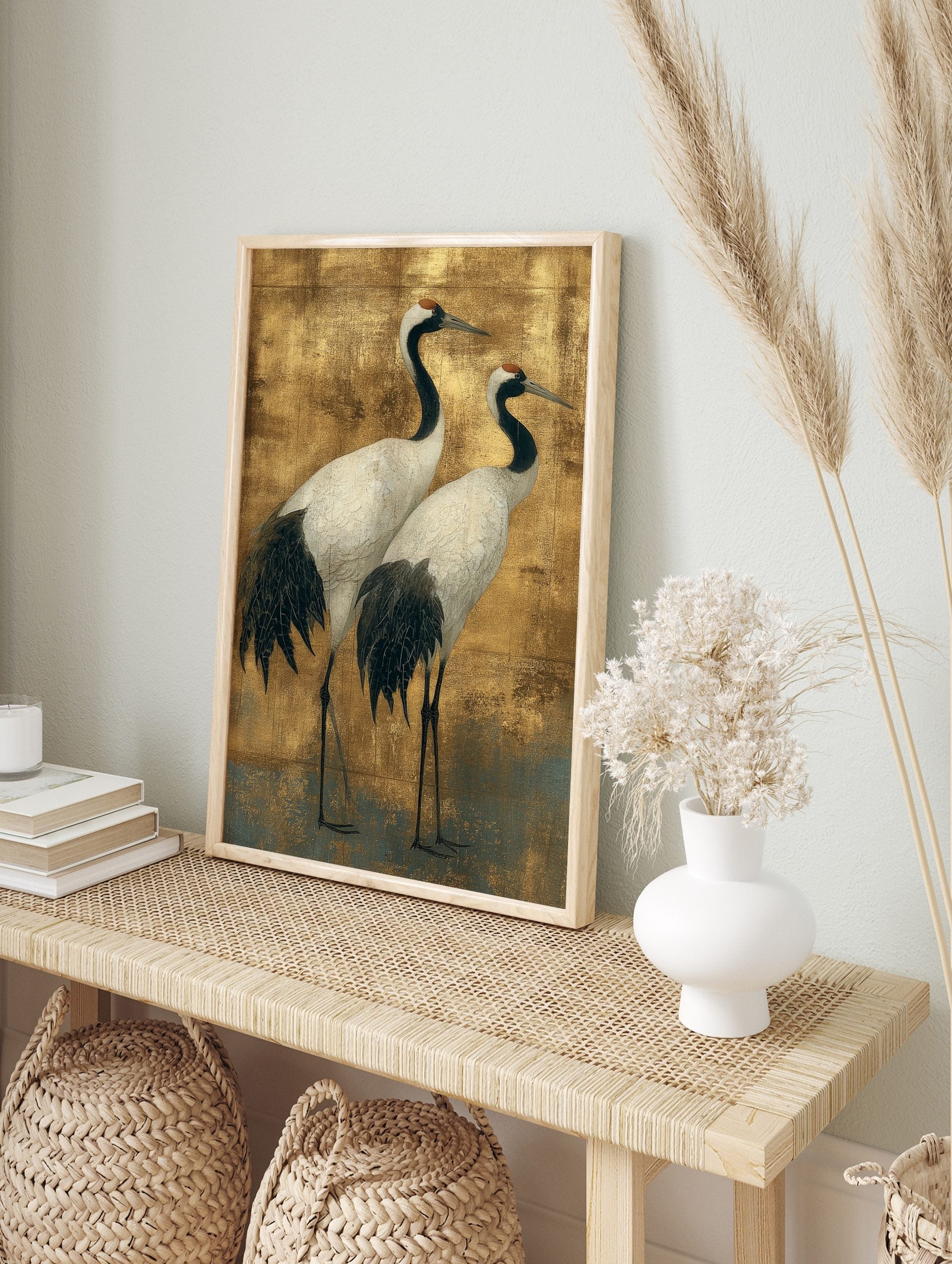 Illustrative Japanese crane wall art featuring two white and black cranes with red crowns on, in an alternate framed mockup