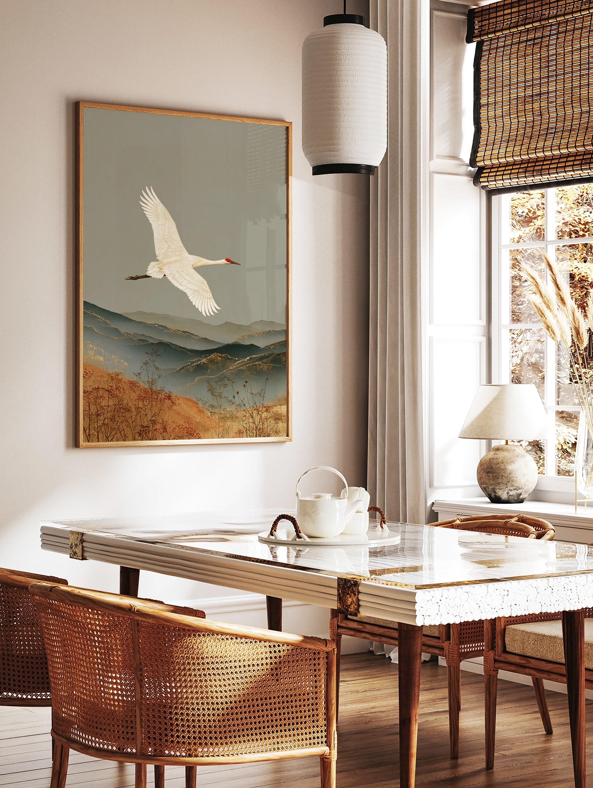 White crane flying over layered mountains and golden grasses, traditional Japanese style nature art, in a styled room mockup