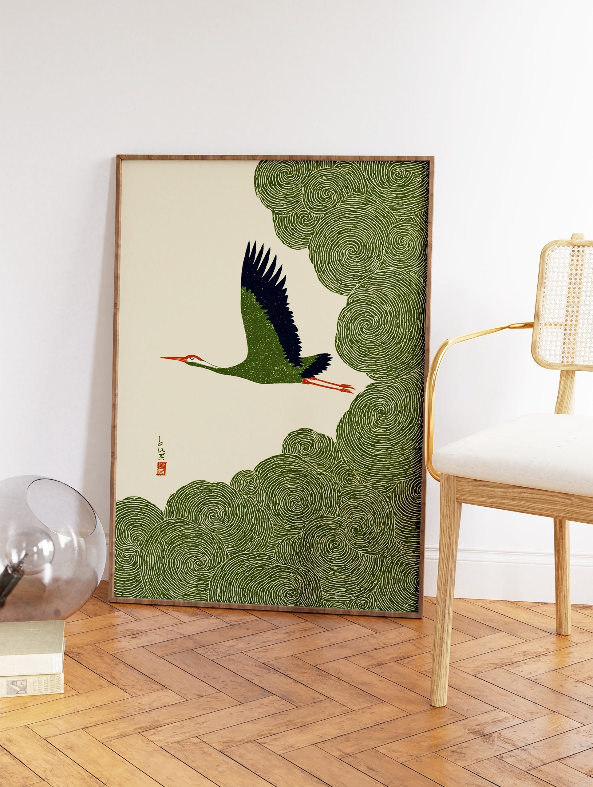 Japanese crane wall art showing a green and blue bird flying over swirling green clouds on a cream background. - Image 2
