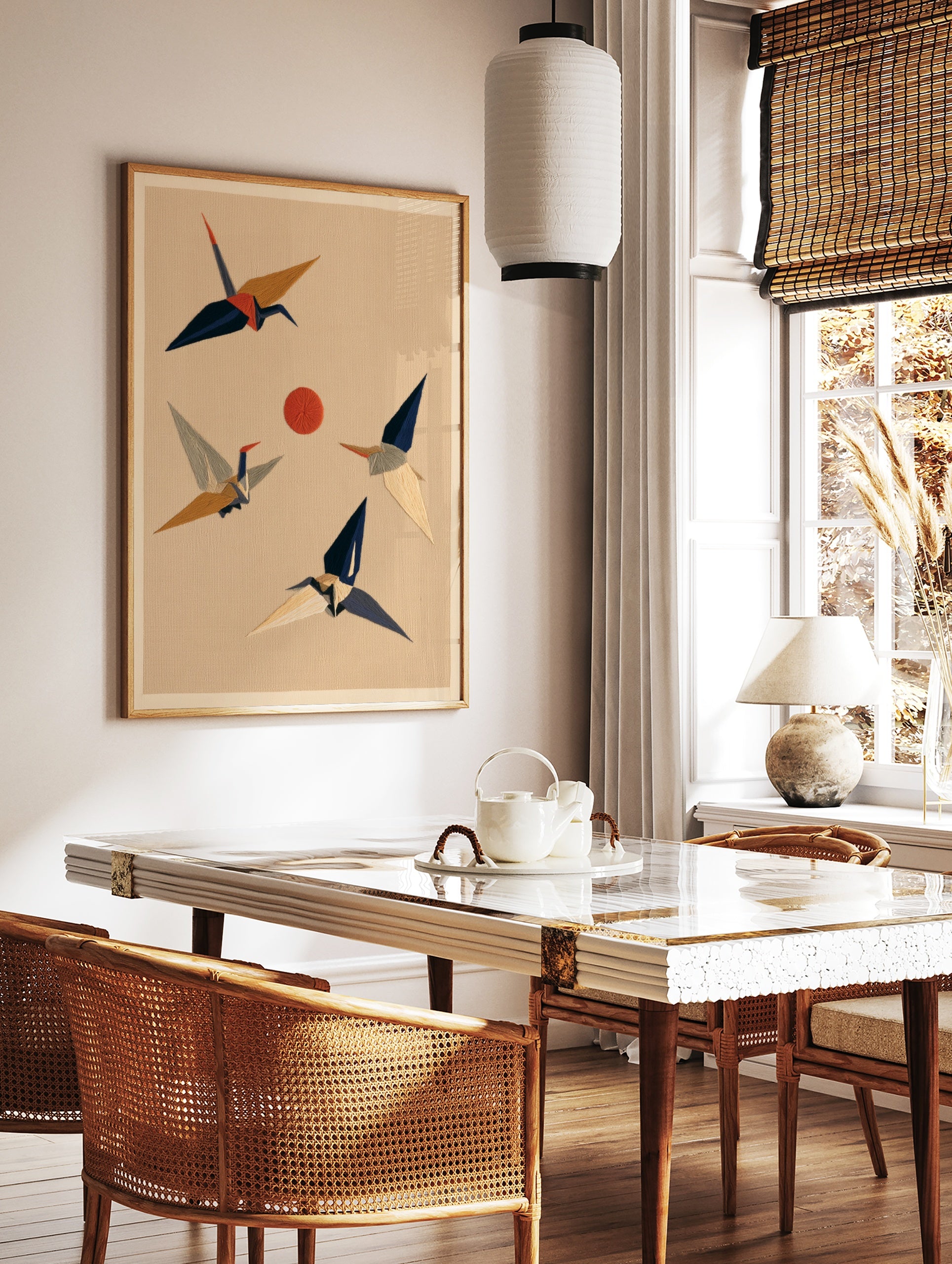 Stylised Japanese crane birds in flight around a red sun on a textured beige background, minimalist, in a styled room mockup