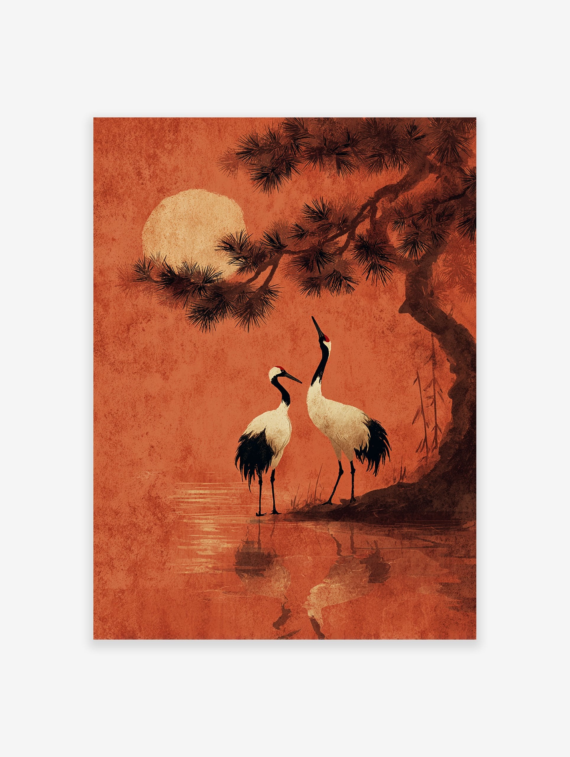 Japanese crane wall art featuring two cranes by water under a pine tree and a large red moon in an orange sky.