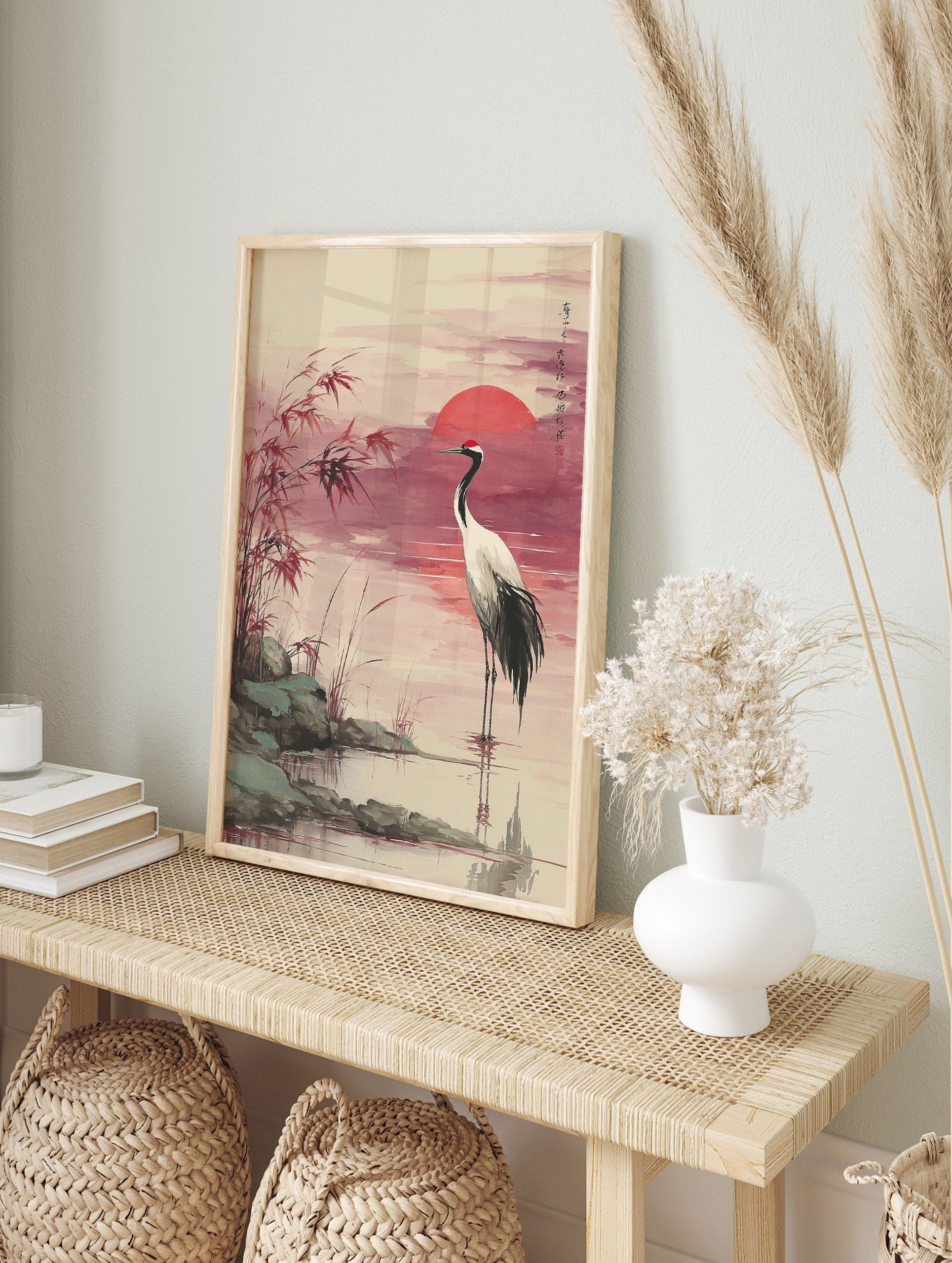 Japanese Red-crowned Crane Wall Art in water at sunset with a red sun, reeds, and rocks in a traditional watercolor style. - Image 3