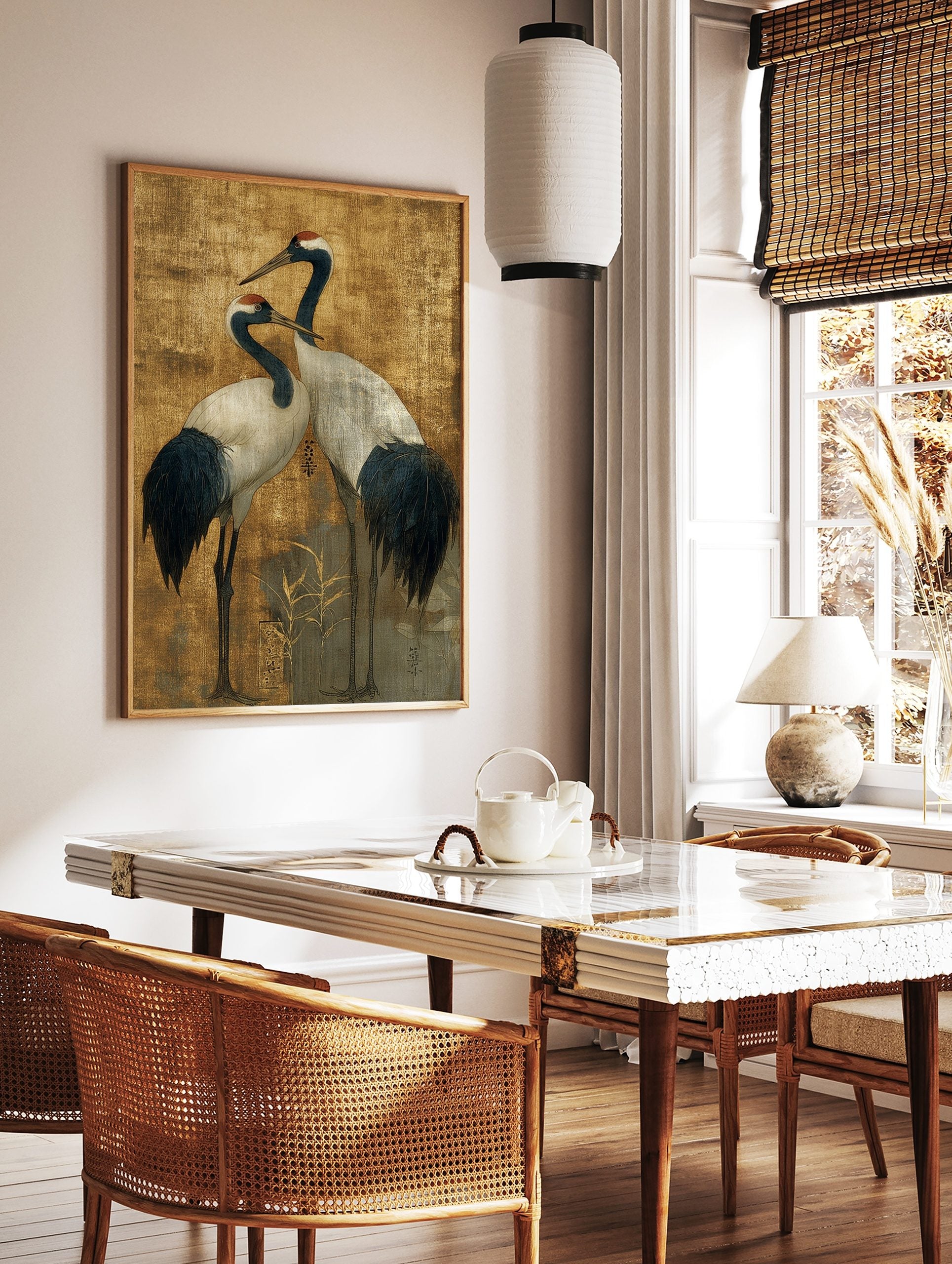 Two elegant Japanese Red-crowned Cranes with dark blue and white plumage on a textured golden, in a styled room mockup