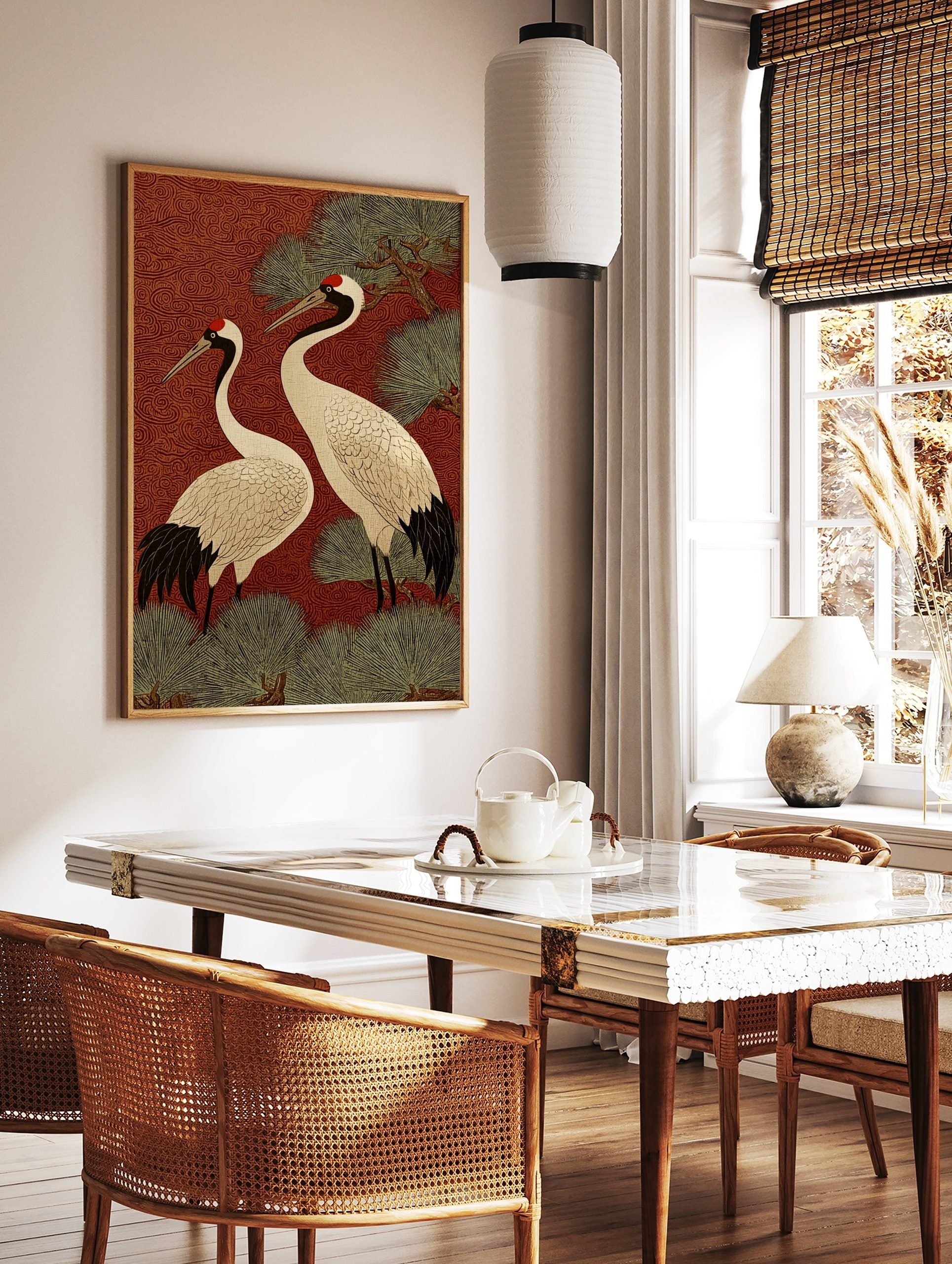 Two Japanese Red-crowned Cranes with black and white plumage, red crowns, against a red swirling, in a styled room mockup