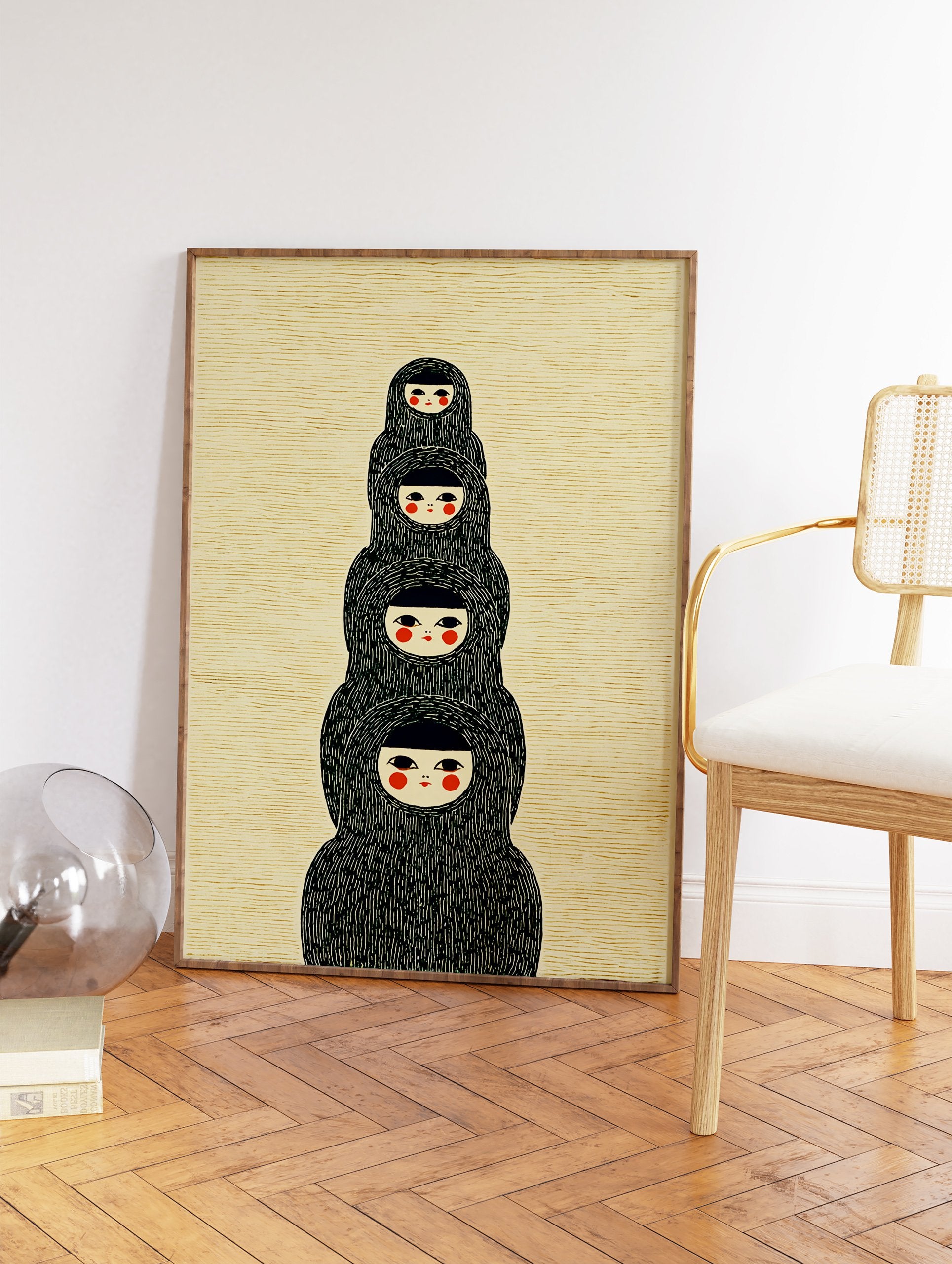 Japanese dolls wall art print showing four stylized figures stacked vertically with black hoods and red cheeks on a textured background. - Image 2