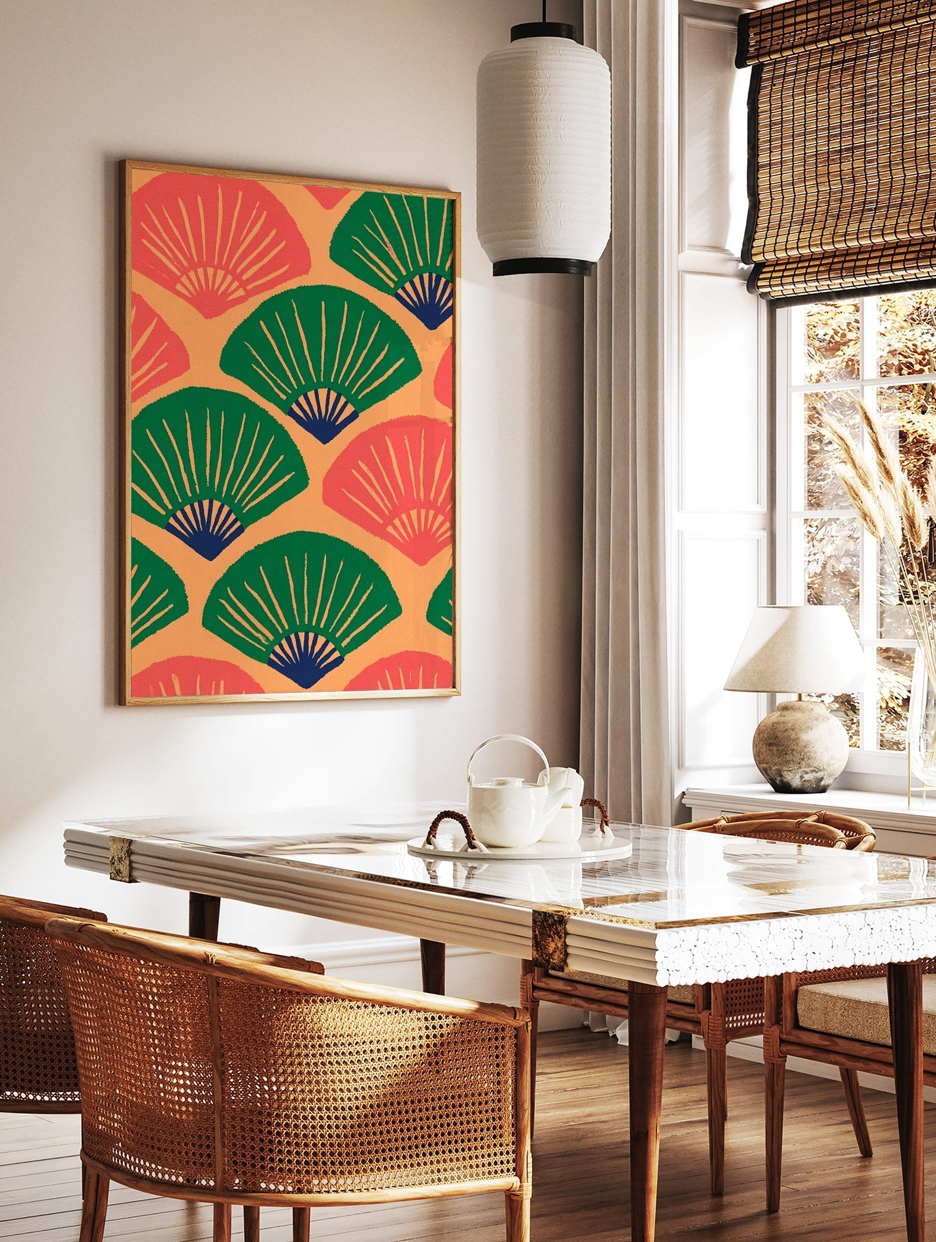 Repeating pattern of green and coral Japanese fans with dark blue accents on an orange background, in a styled room mockup