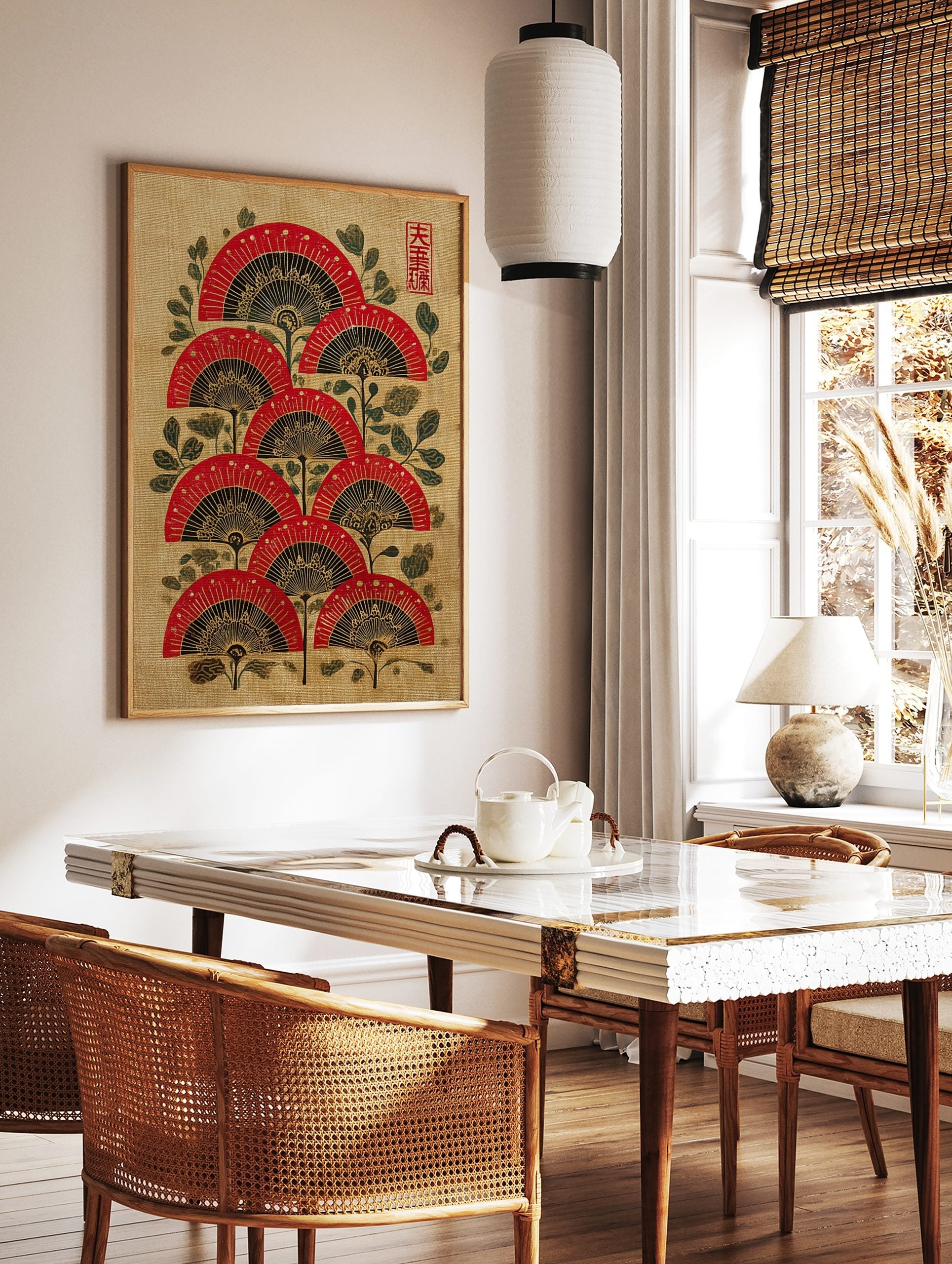 Red, black, and gold Japanese folding fan wall art with green foliage on a textured beige background, in a styled room mockup
