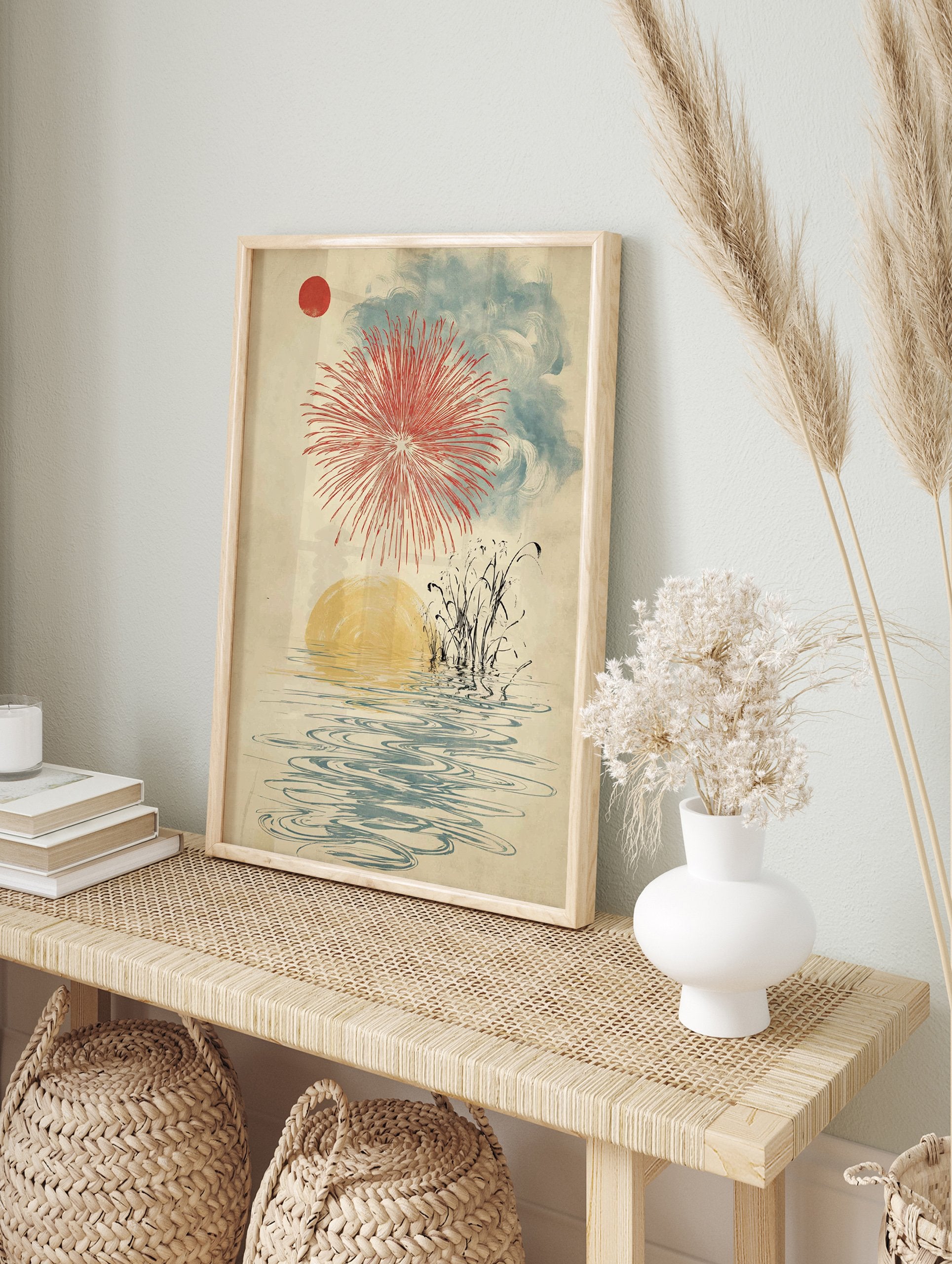 Japanese fireworks wall art with a red sun, red firework explosion, blue clouds, yellow water reflection, and reeds. - Image 3