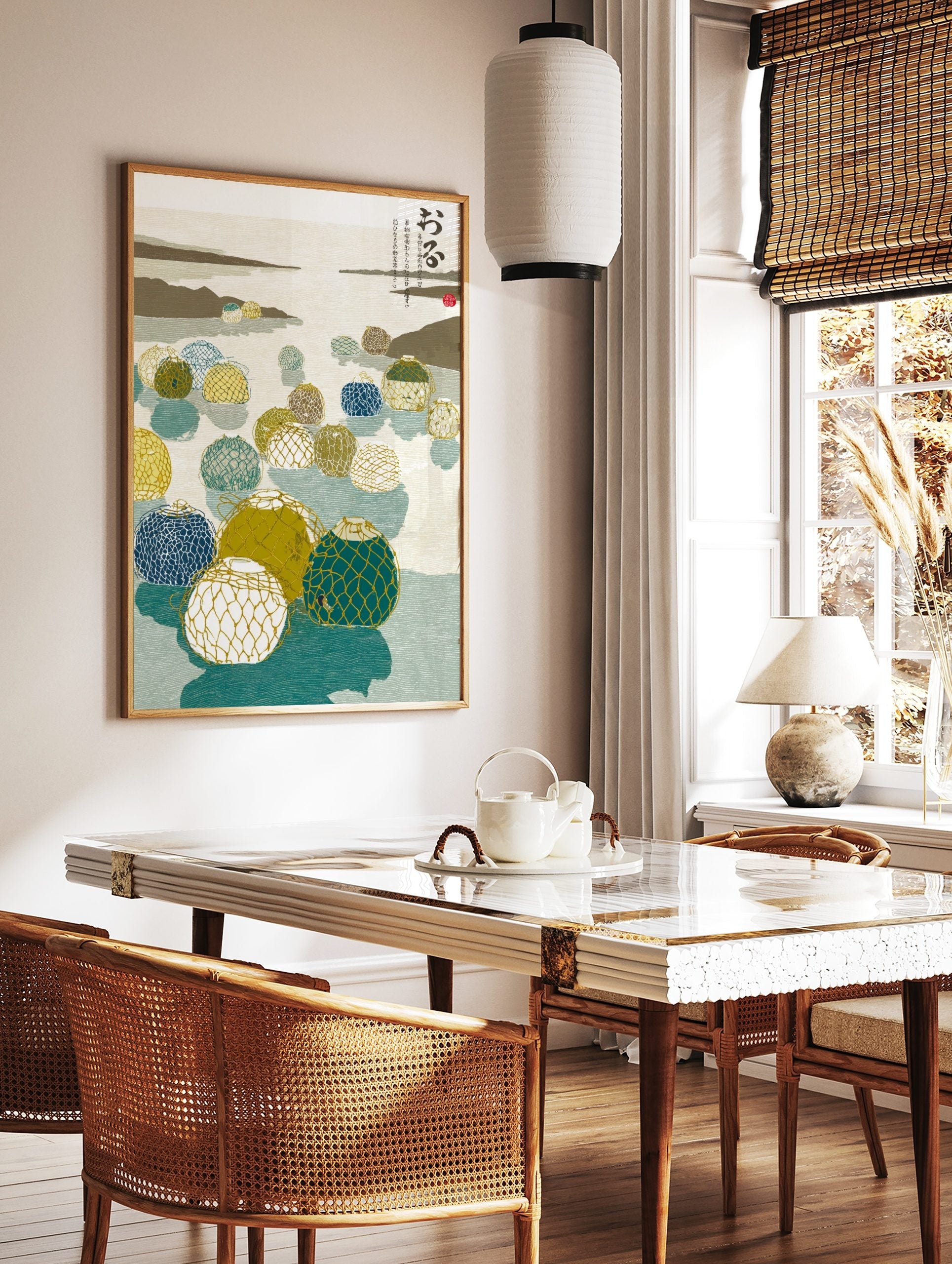 Illustrative Japanese fishing floats with netting in blue, green, and yellow on calm water with, in a styled room mockup