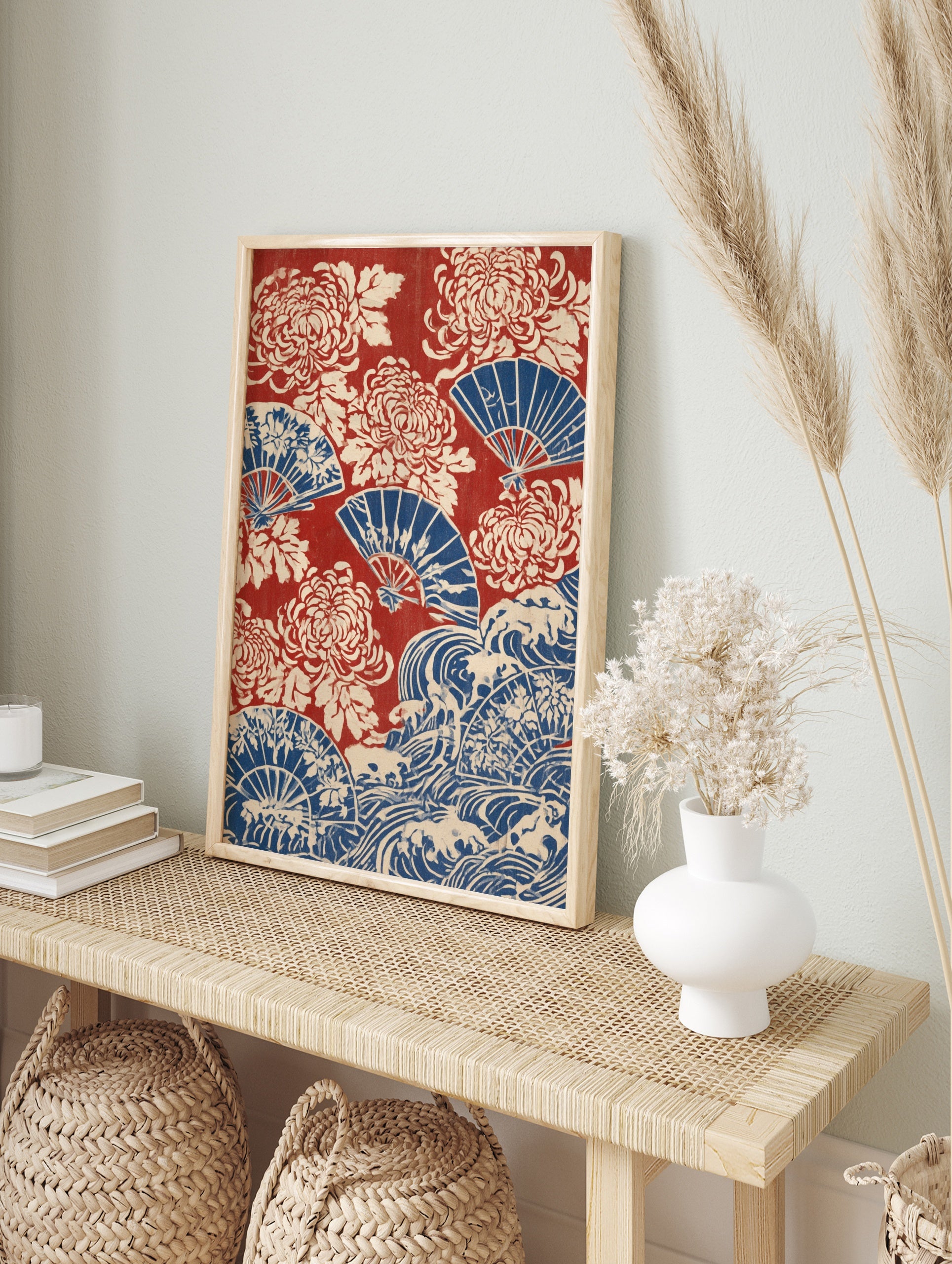 Japanese-style print with red background, blue folding fans, and cream-coloured chrysanthemum, in an alternate framed mockup