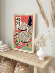 Japanese Food Poster featuring gyoza dumplings, sake bottle, skewers, limes, and tomatoes on a red and green background. - Image 4