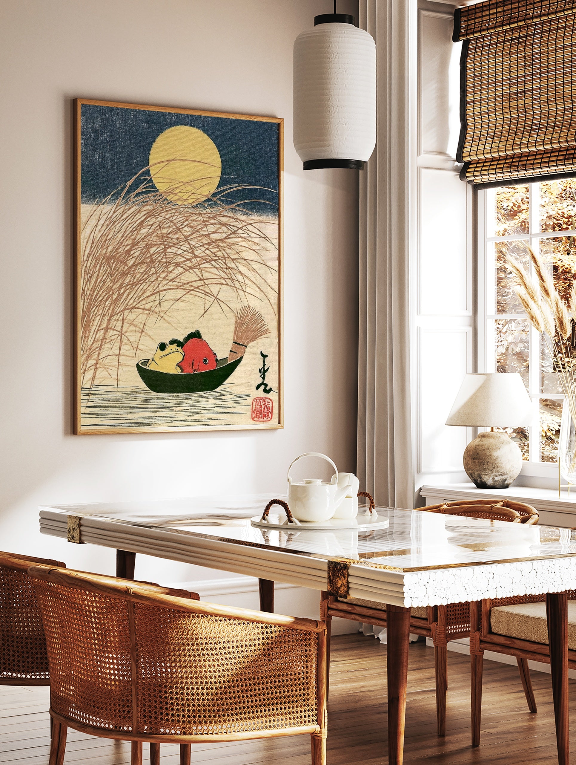 Japanese woodblock-style print of a yellow frog and red fish in a boat under a full moon with tall, in a styled room mockup