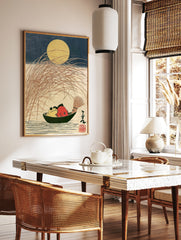 Japanese woodblock-style print of a yellow frog and red fish in a boat under a full moon with tall, in a styled room mockup