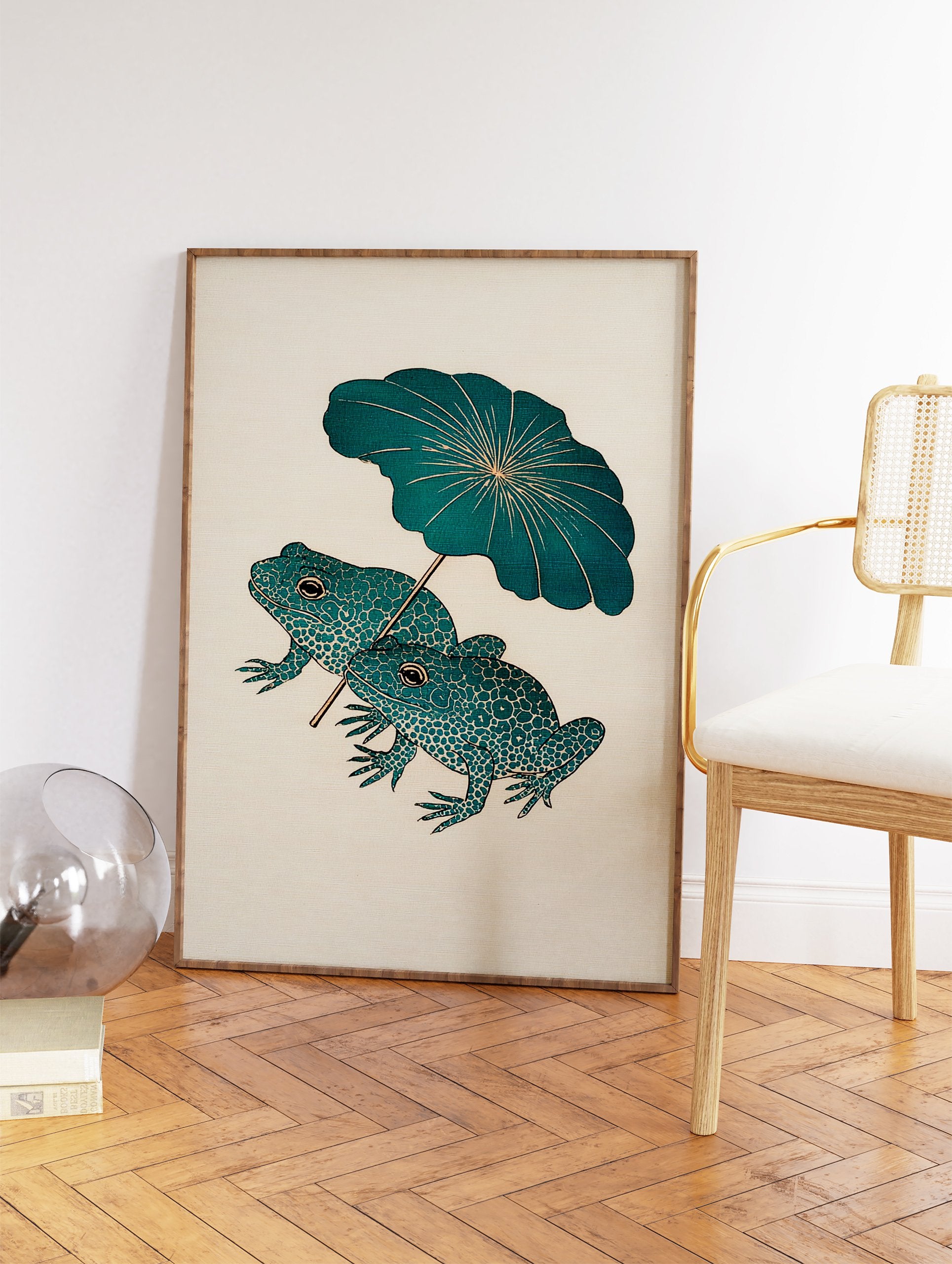 Japanese frog art print showing two teal frogs with patterned skin holding a large green lotus leaf as an umbrella. - Image 2