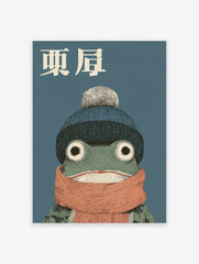 Japanese frog art print featuring a green frog wearing a blue knit hat with a pompom and an orange scarf on a blue background.