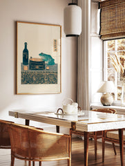 Japanese Ukiyo-e style print of a teal frog on a record player with a sake bottle and cups on a, in a styled room mockup