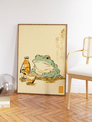 Traditional Japanese frog wall art illustration with a frog, sake bottle, and cup, featuring calligraphy on a light background. - Image 2