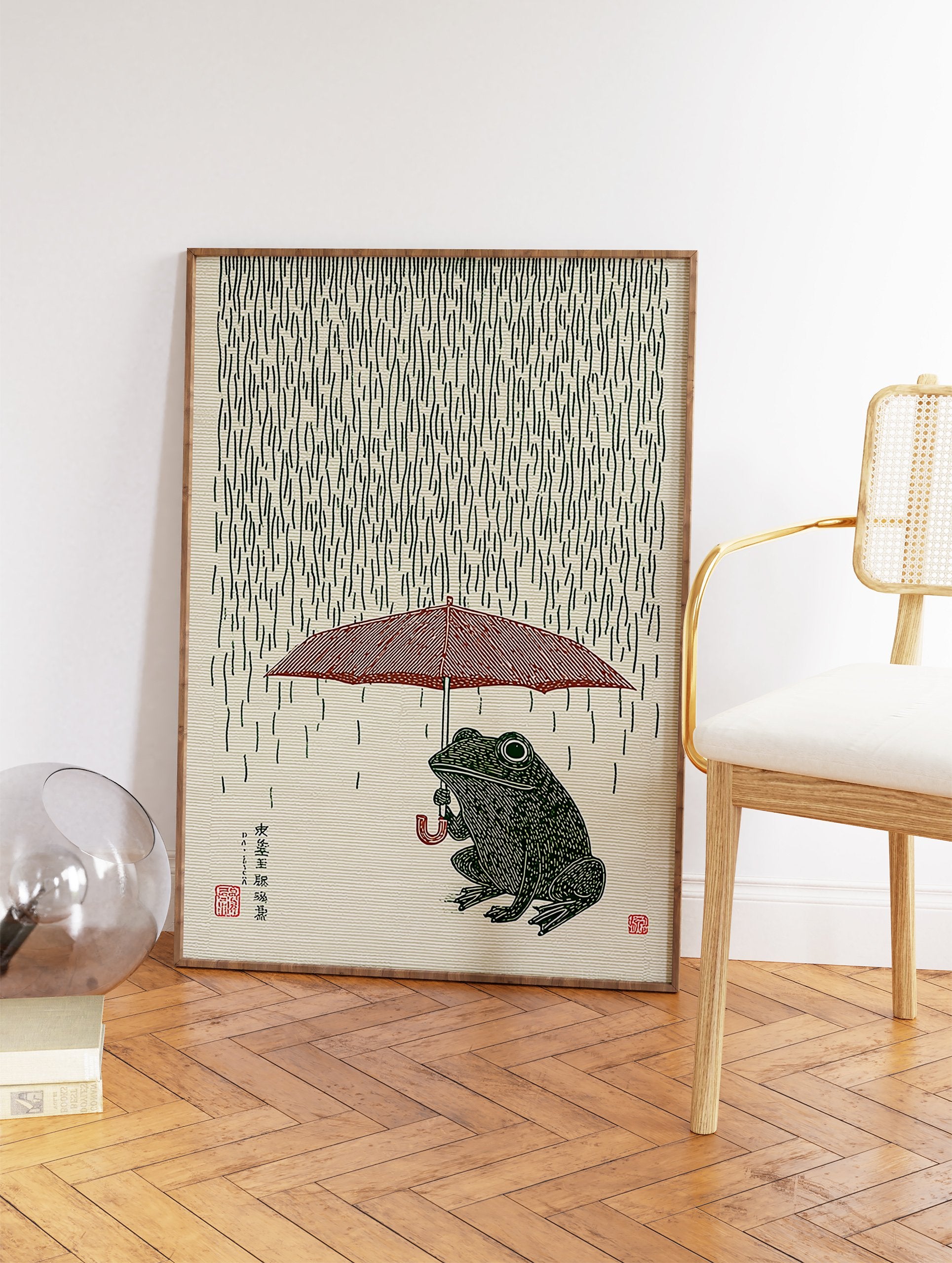 Japanese style illustration of a green frog holding a red umbrella in the rain on a textured beige background. - Image 2