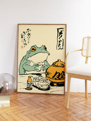 Vintage Japanese frog wall art illustration of a green frog drinking tea from a cup, with an orange teapot and calligraphy. - Image 2