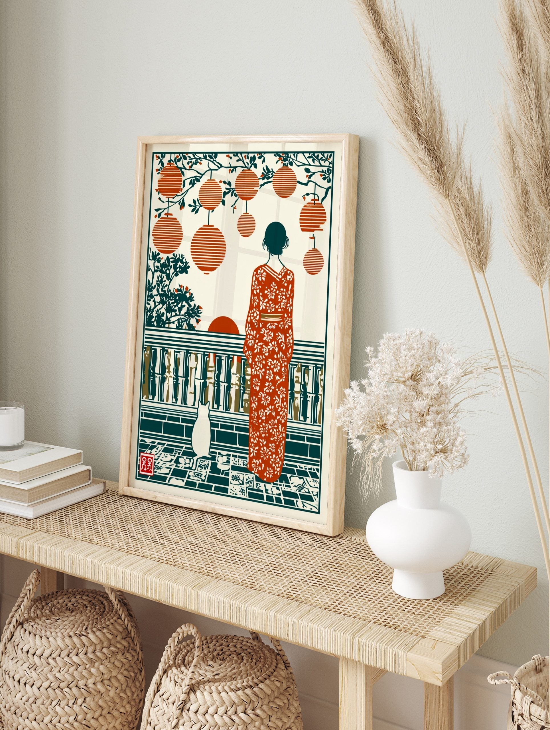 Illustrative print of a woman in floral kimono with a cat, lanterns, and sunset on a tiled, in an alternate framed mockup