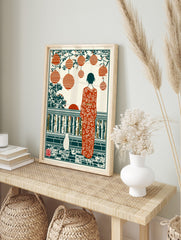 Illustrative print of a woman in floral kimono with a cat, lanterns, and sunset on a tiled, in an alternate framed mockup