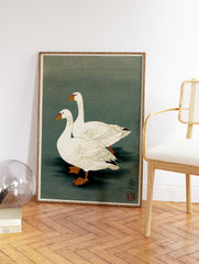 Two white geese in a pond, depicted in a traditional Japanese illustration style with a green-grey background. - Image 2