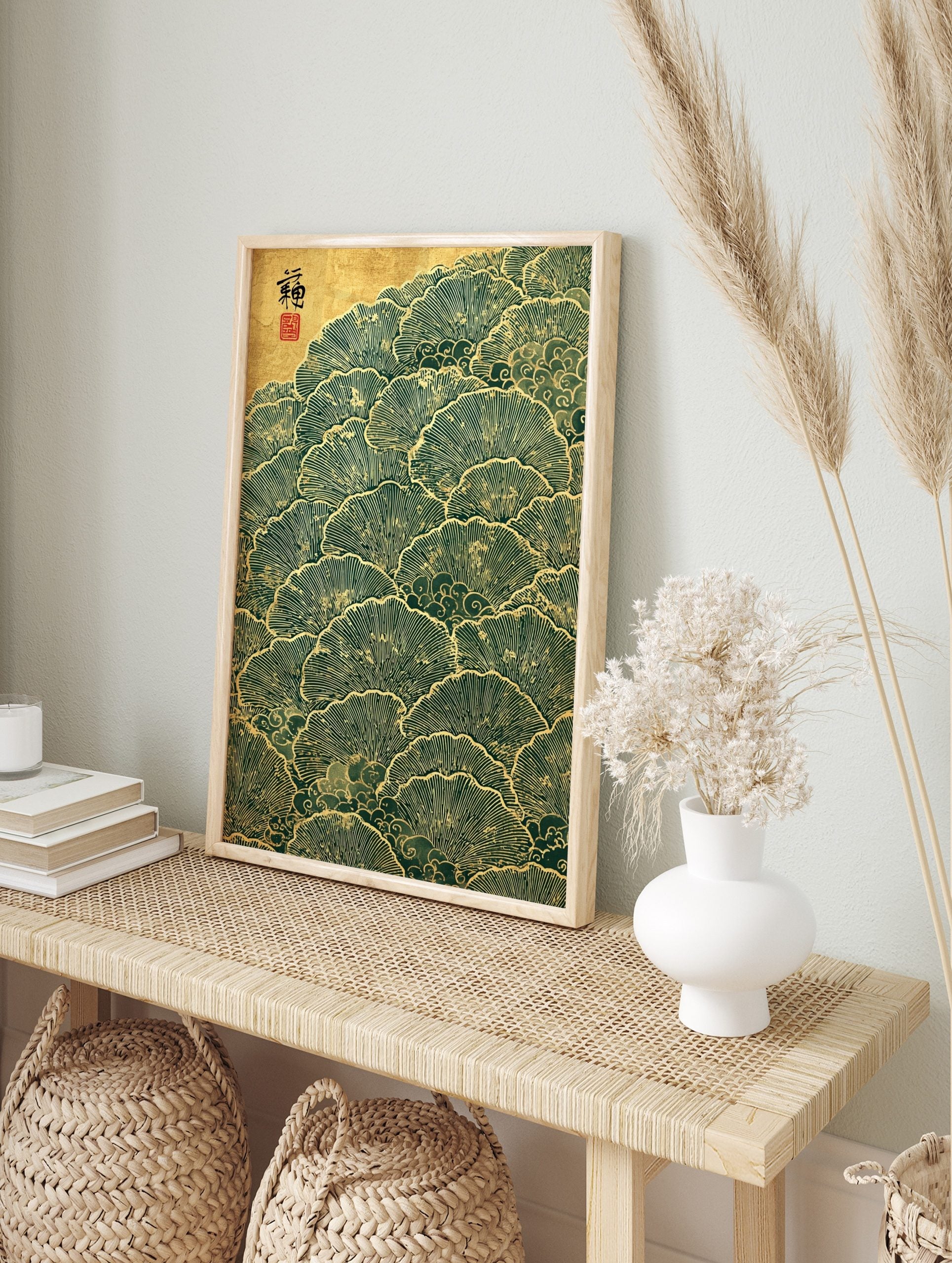 Stylised Japanese ginkgo leaves in green and gold, overlapping in a pattern with cloud motifs, in an alternate framed mockup