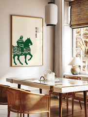 Green illustrative print of a Japanese horseback rider and horse with vertical Japanese text on, in a styled room mockup
