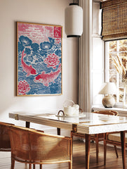 Japanese woodblock print of two red koi fish swimming among red lotus flowers and blue lily pads in, in a styled room mockup