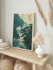 Japanese landscape poster depicting a misty mountain river scene with green trees, a prominent pine, and a small boat. - Image 4