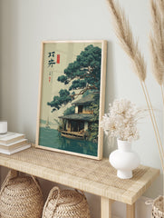 Japanese landscape poster showing a traditional house by the water with a large pine tree and a sailboat in the distance. - Image 4
