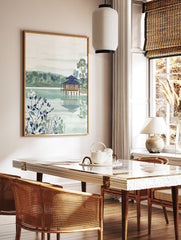Japanese landscape wall art featuring a serene lakeside house, lush trees, and white botanical flowers in the foreground. - Image 2