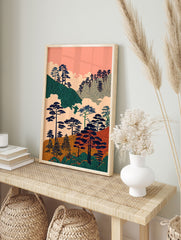 Stylized Japanese landscape wall art with dark pine trees on green and orange textured hills under a pink sky with clouds. - Image 3