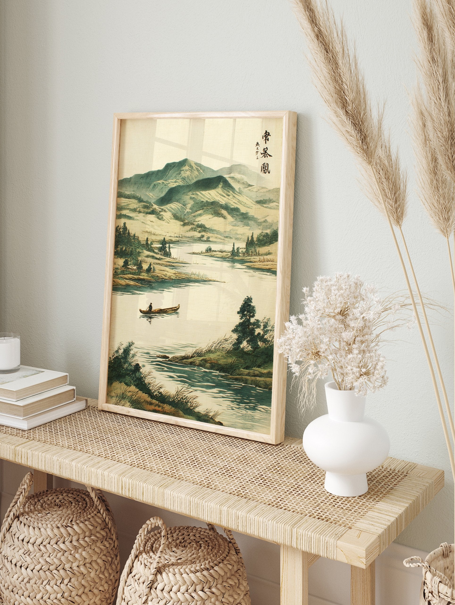 Japanese landscape wall art featuring a serene river, mountains, trees, and a person in a boat, with traditional calligraphy. - Image 3