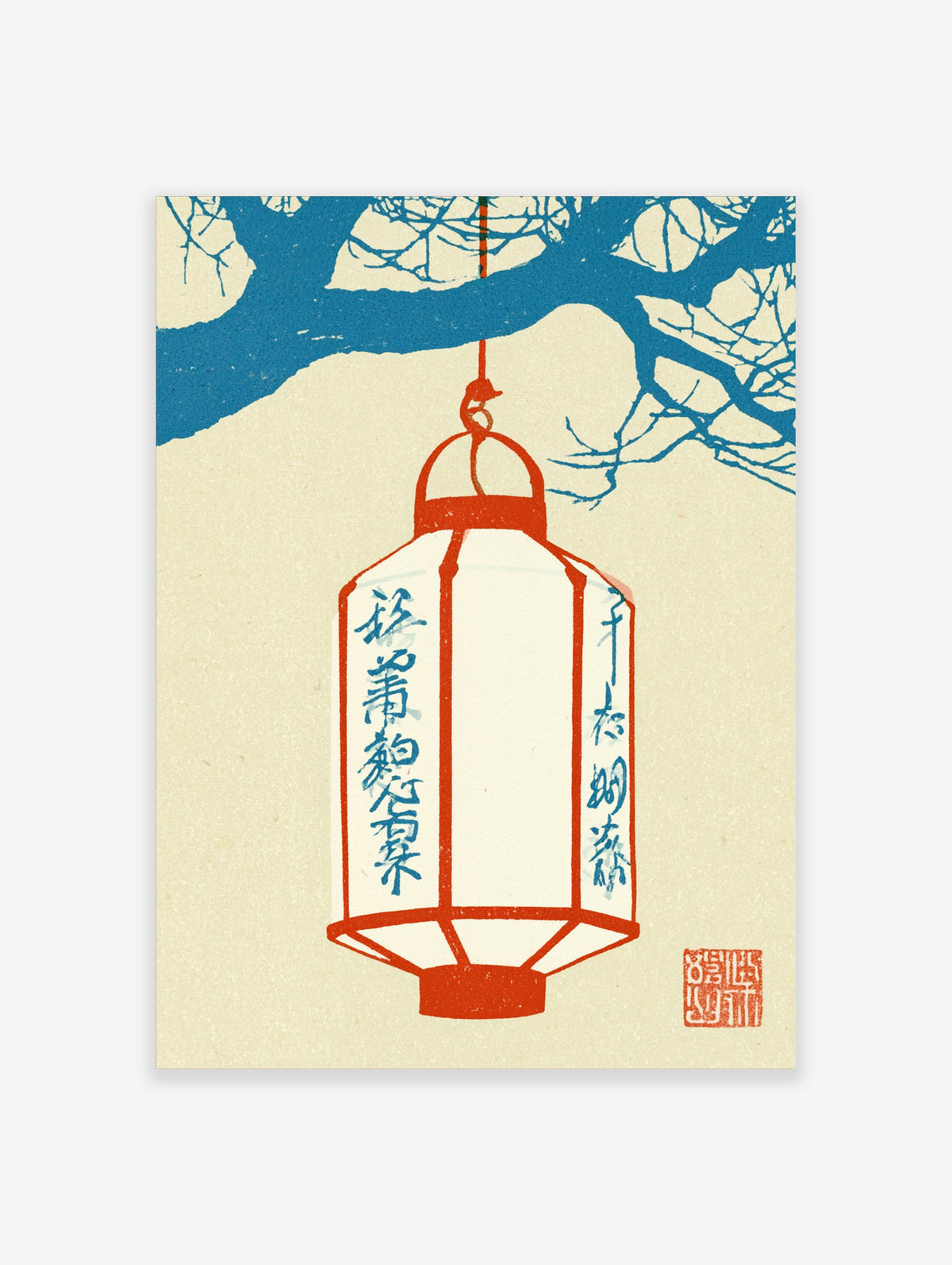 Japanese lantern wall art with a red lantern hanging from blue tree branches on a cream background
