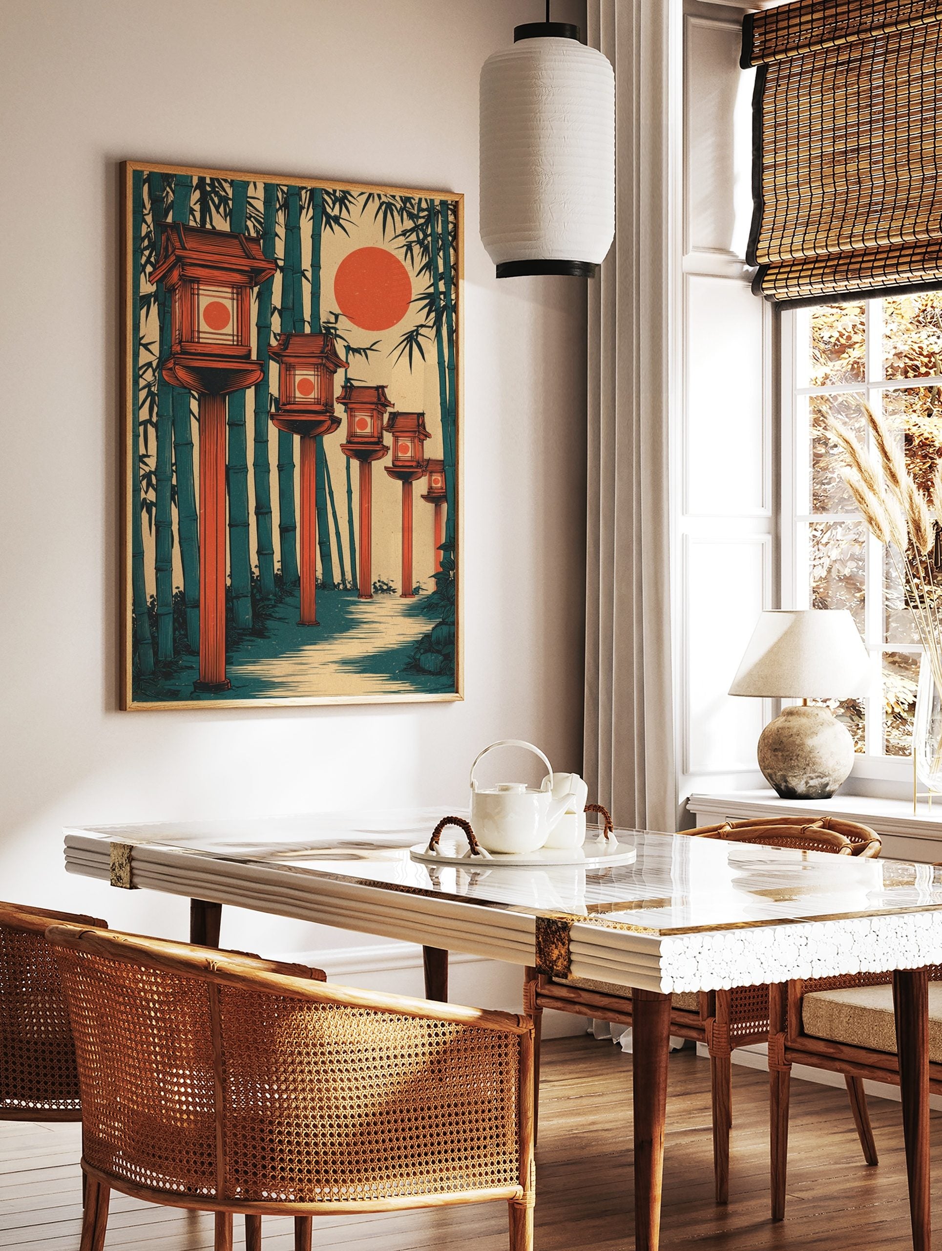 Illustrative print of Japanese lanterns along a path in a bamboo forest with a large red sun, in a styled room mockup