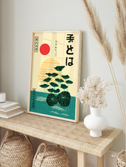 Japanese Lotus Poster with dark green lotus leaves, a red sun, and yellow striped horizon over teal water in Ukiyo-e style. - Image 4