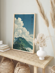 Japanese mountain landscape poster with lush green peaks shrouded in soft white clouds under a clear blue sky. - Image 4