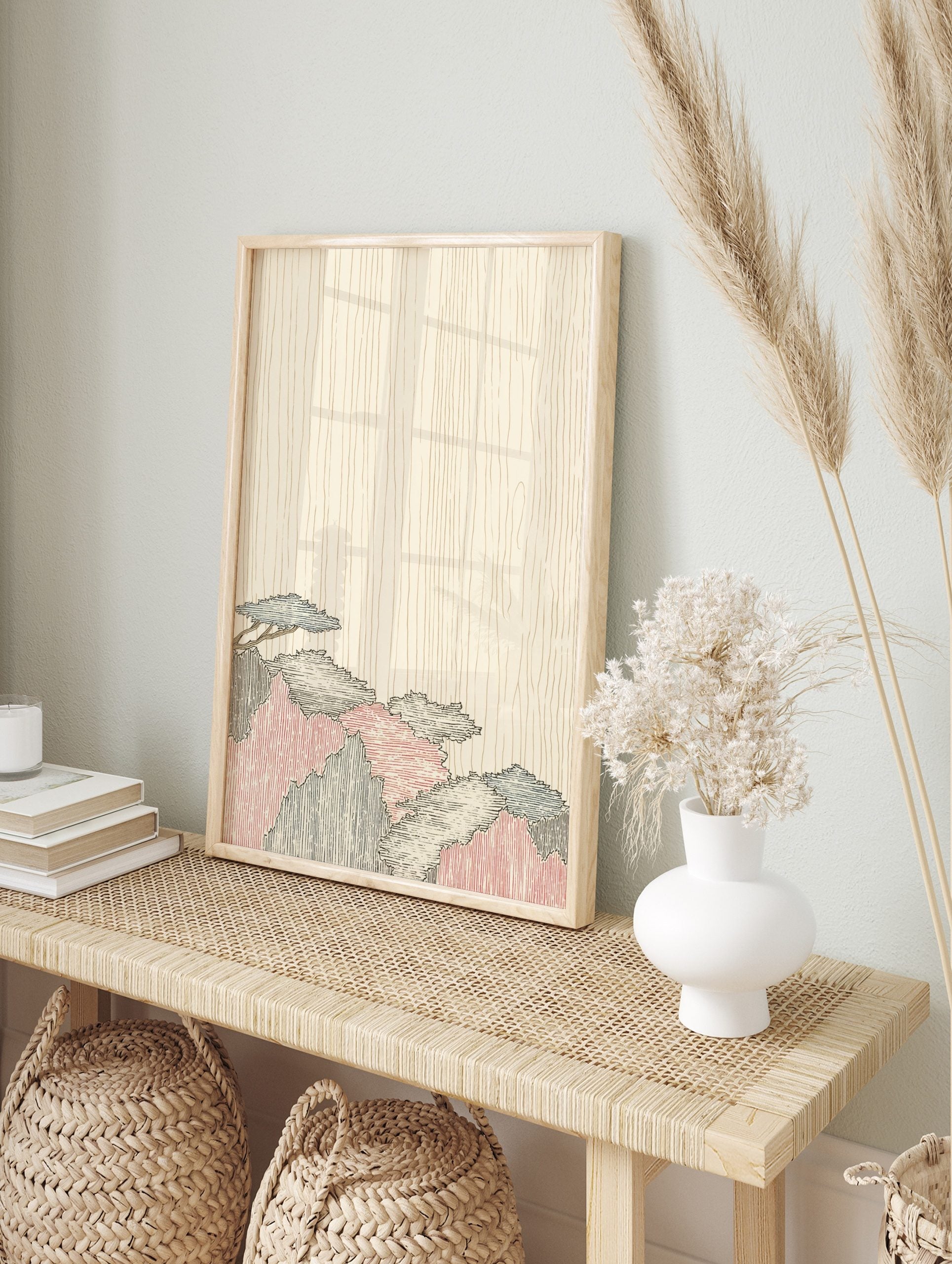 Stylized Japanese mountain landscape print with blue, red, black foliage against a beige wood, in an alternate framed mockup