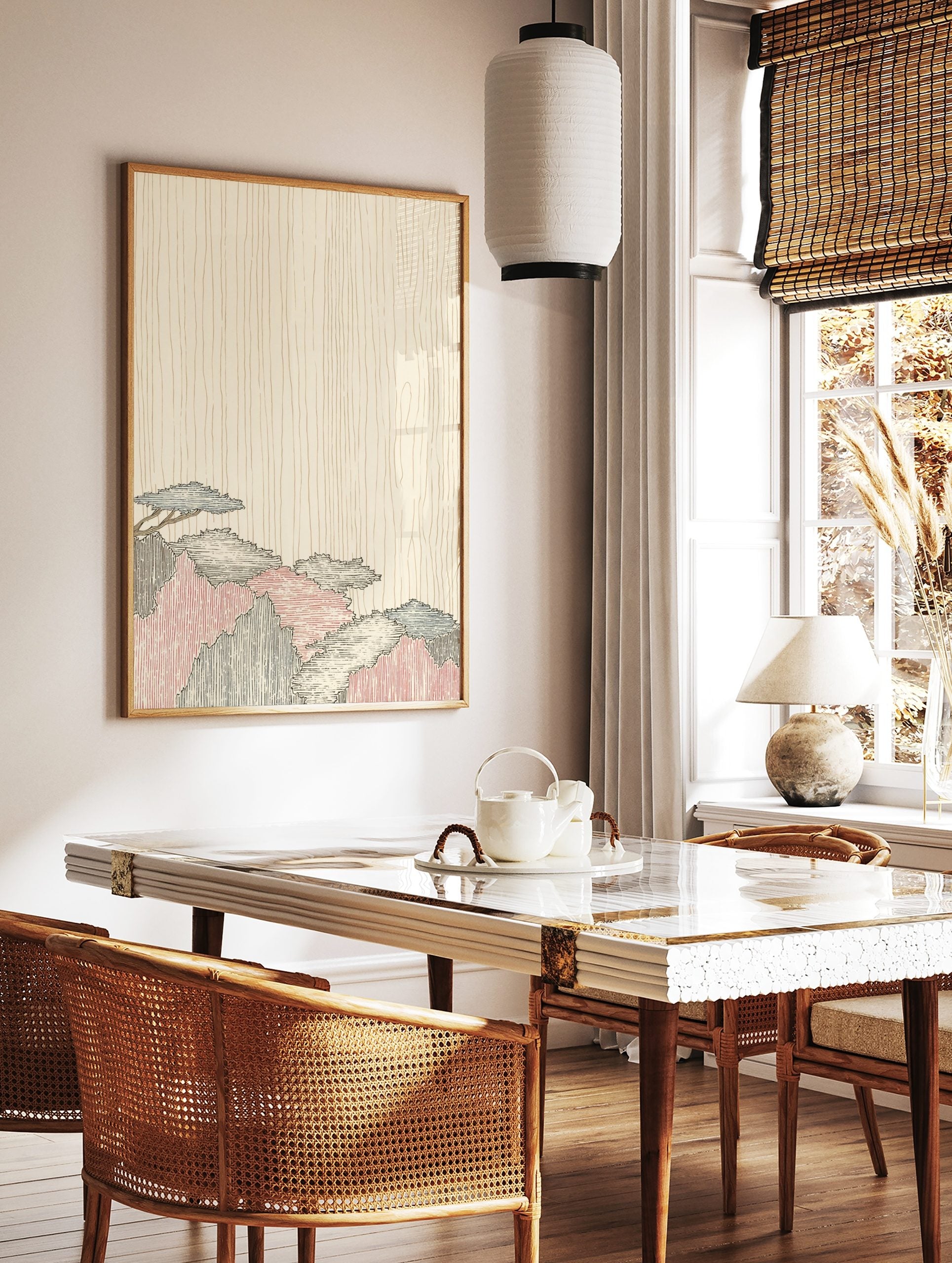 Stylized Japanese mountain landscape print with blue, red, black foliage against a beige wood grain, in a styled room mockup