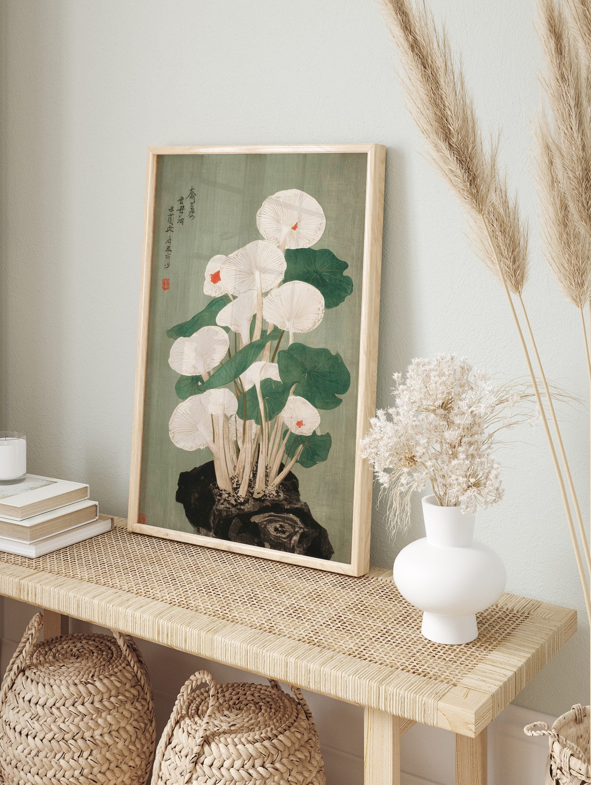 Japanese woodblock print of white gilled mushrooms with red spots, green leaves, and, in an alternate framed mockup