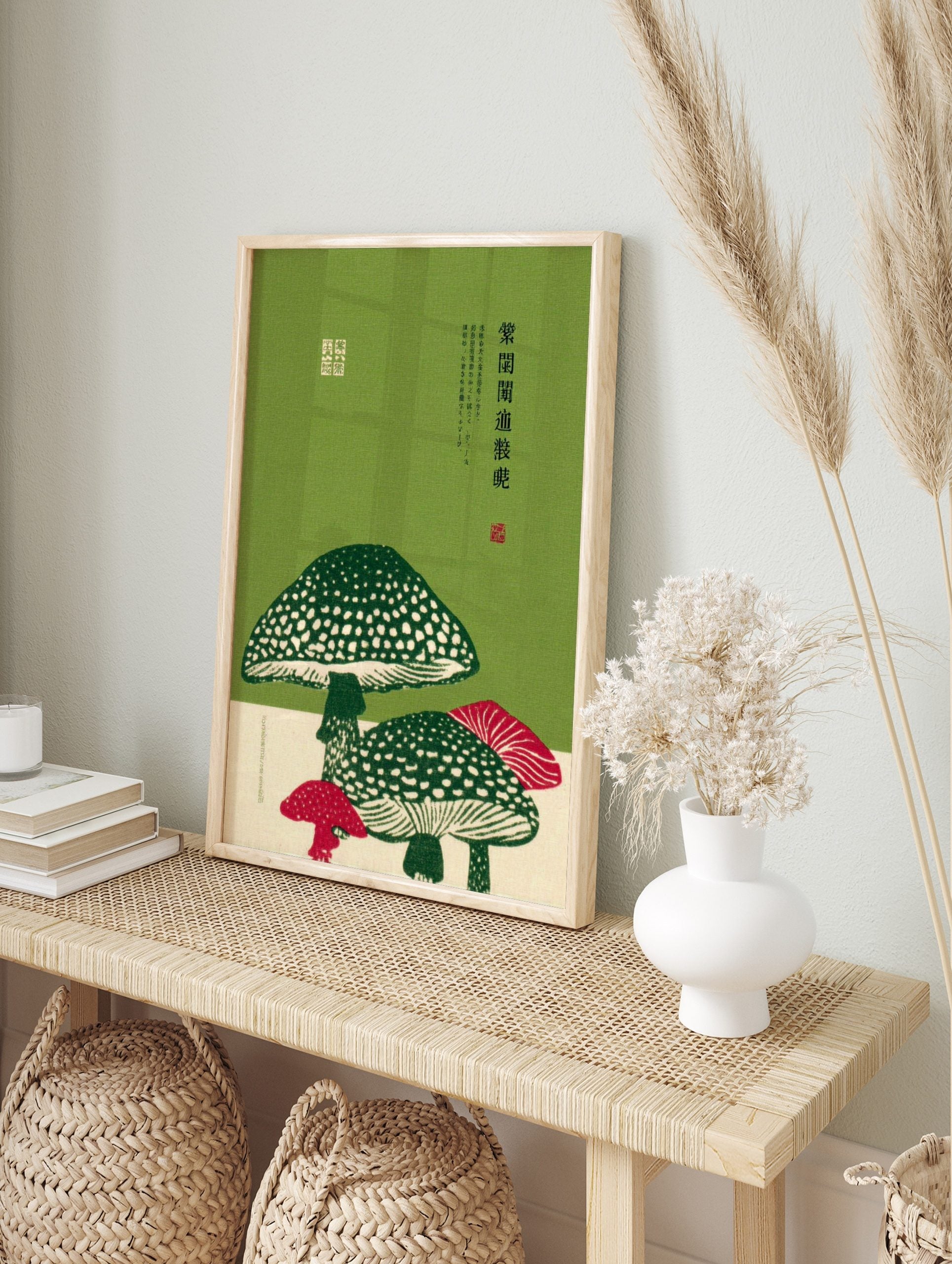 Japanese botanical illustration of green and white spotted mushrooms with red accents and, in an alternate framed mockup