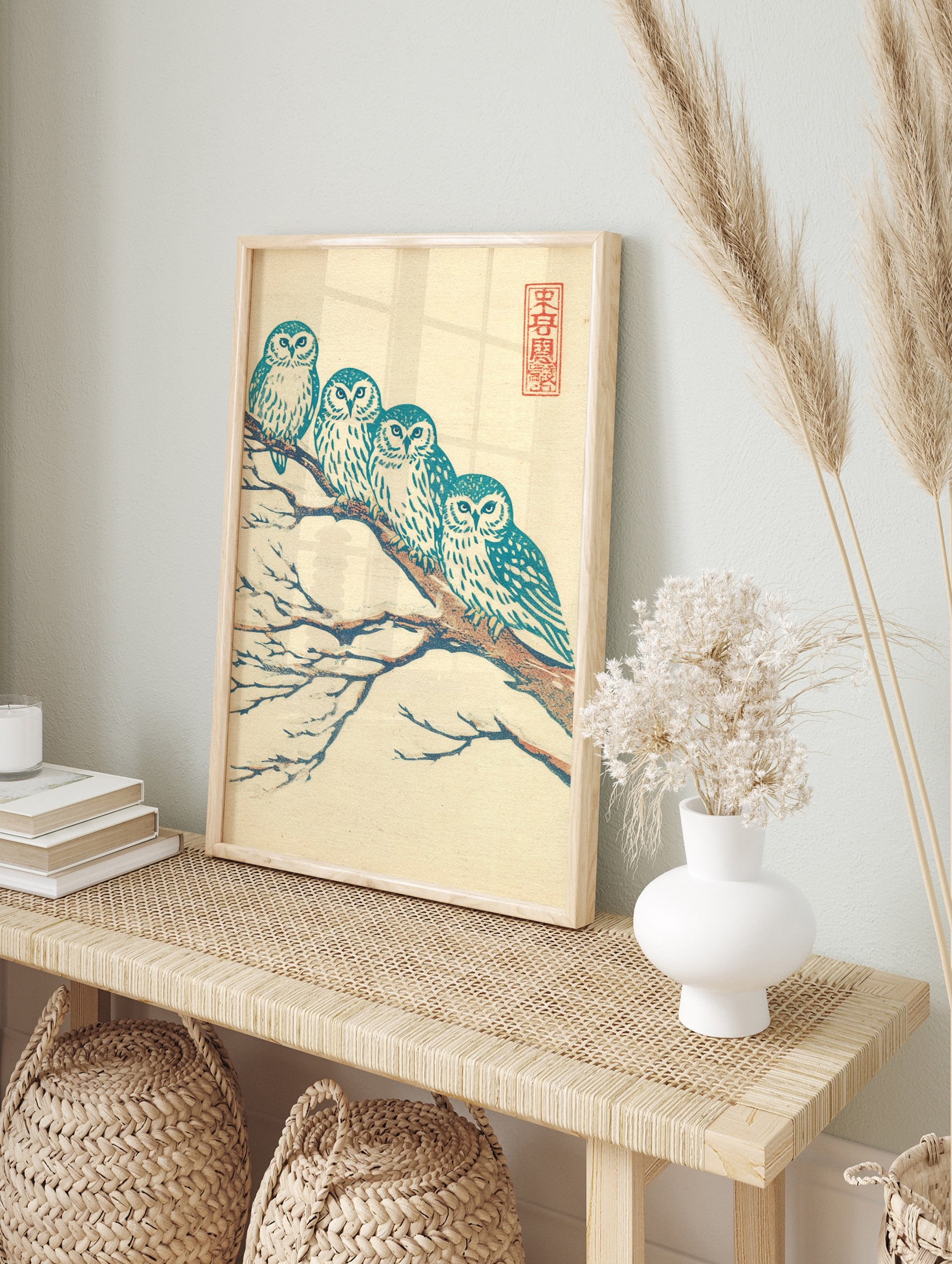 Japanese owl art print of four teal and white owls perched on a brown, snow-covered branch against a cream background. - Image 3
