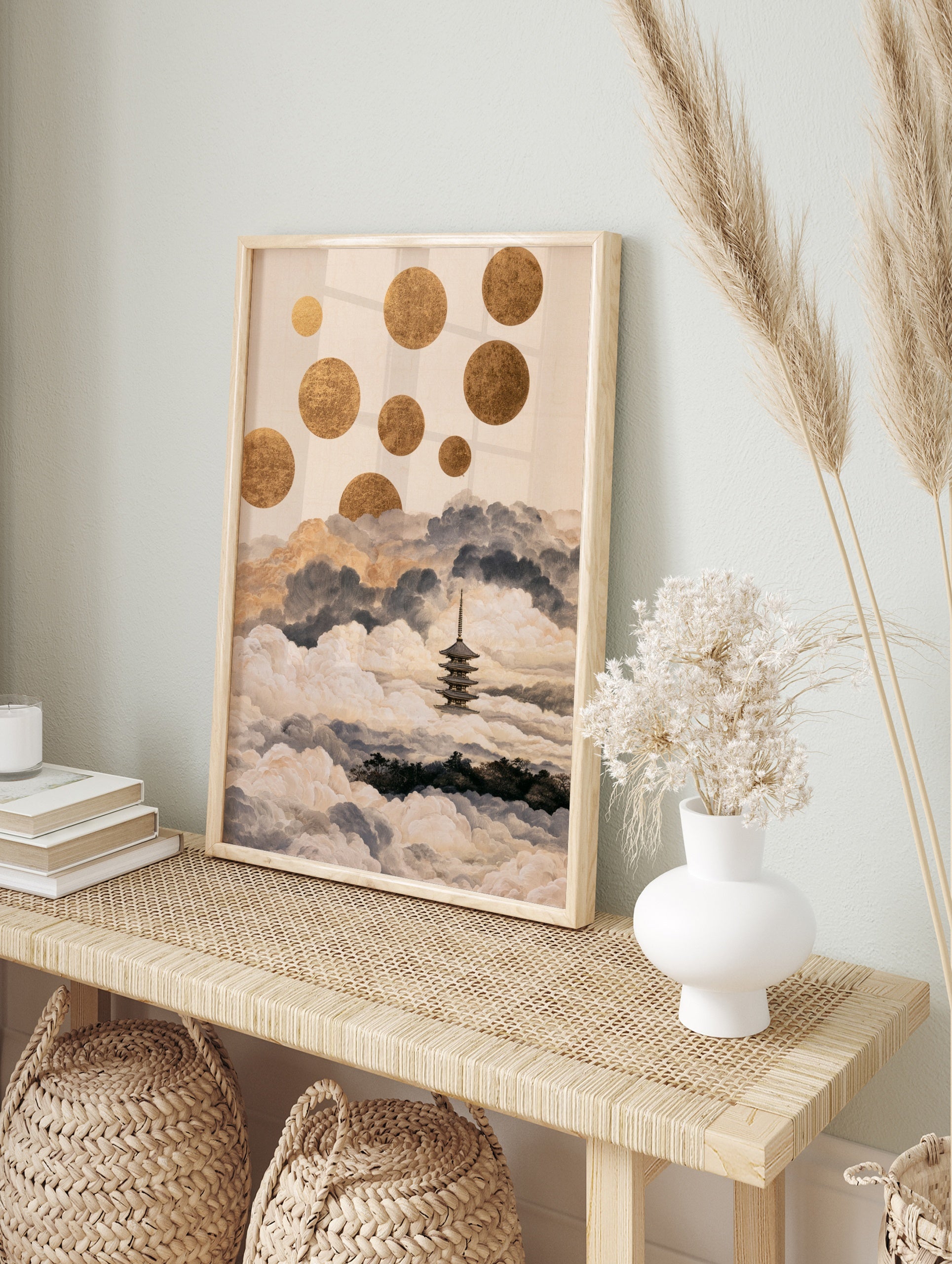 Japanese pagoda emerging from clouds with floating gold circles, illustrative style wall art, in an alternate framed mockup
