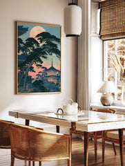 Japanese pagoda with pine trees under a full moon, illustrative twilight landscape art print, in a styled room mockup