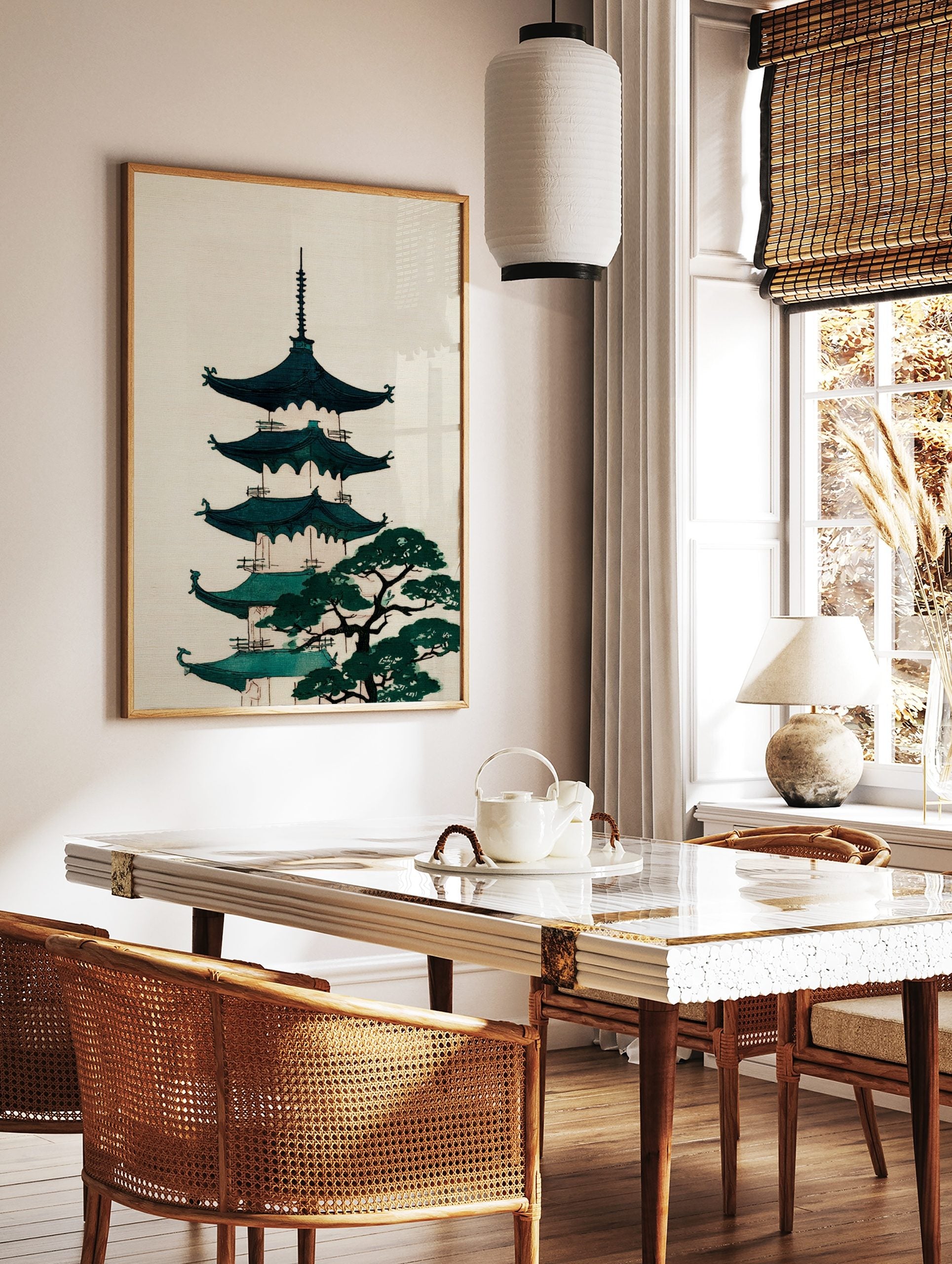 Illustrative Japanese pagoda with teal roofs and a green pine tree on a cream background, in a styled room mockup