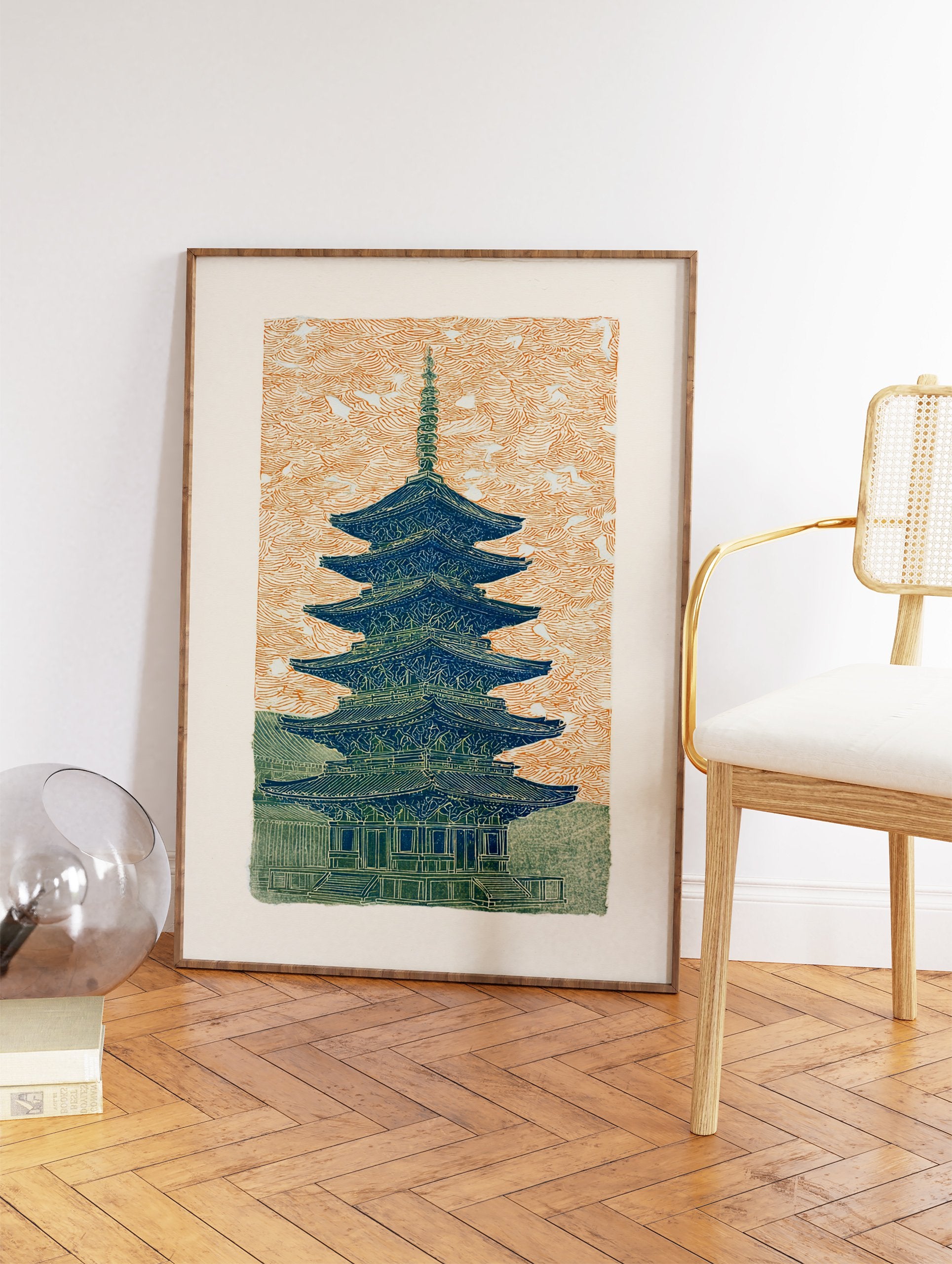 Japanese Pagoda woodblock print featuring a blue and green temple against an orange patterned sky, cultural wall art. - Image 2