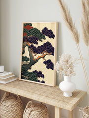 Close-up of a Japanese pine tree with dark purple and green needles on orange-brown branches, in an alternate framed mockup