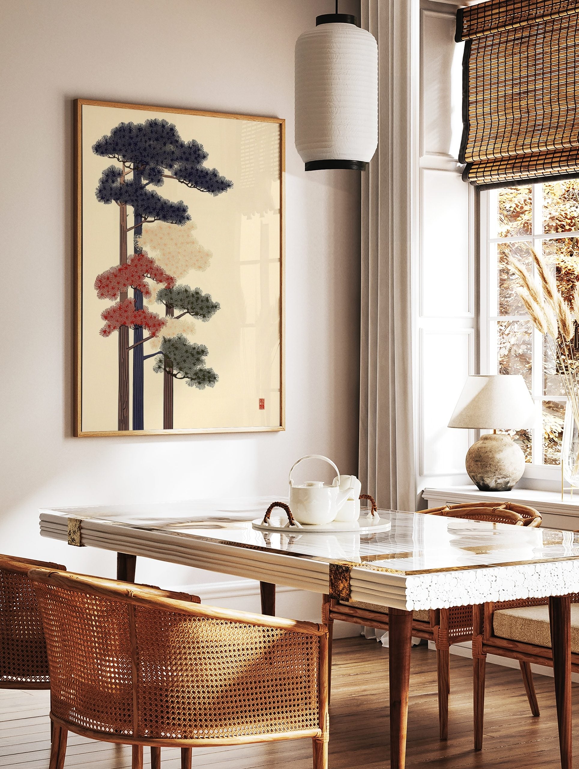 Stylised Japanese pine tree art print with navy, red, and green foliage on a light background, in a styled room mockup