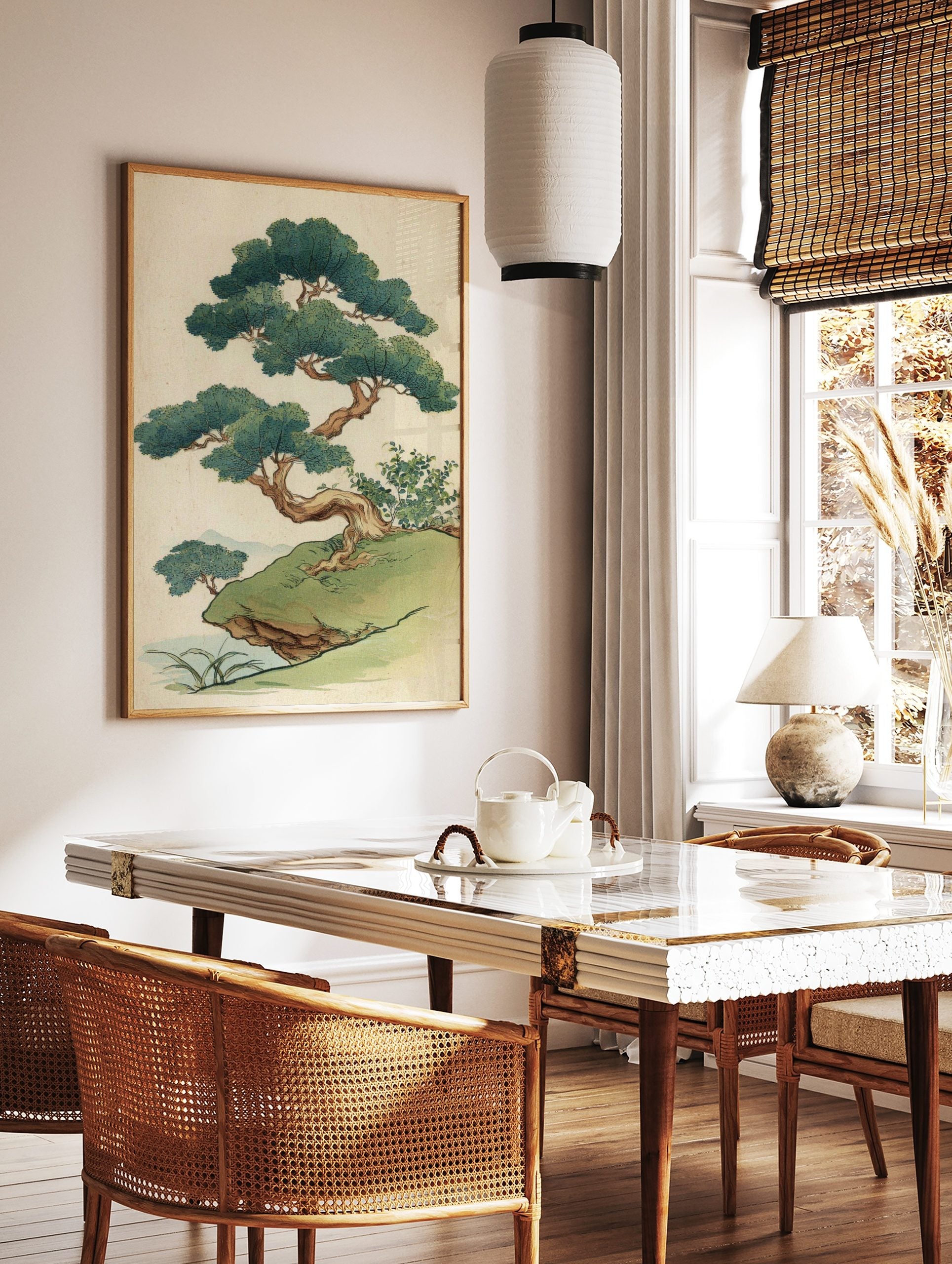 Stylised Japanese pine tree illustration on a grassy cliff with green foliage and brown trunk, in a styled room mockup